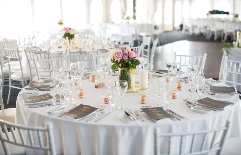 Simple yet elegant table setting for the reception. 