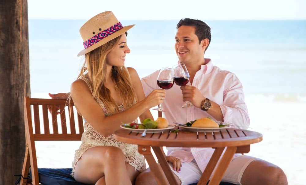 Newlyweds relaxing on the beach.