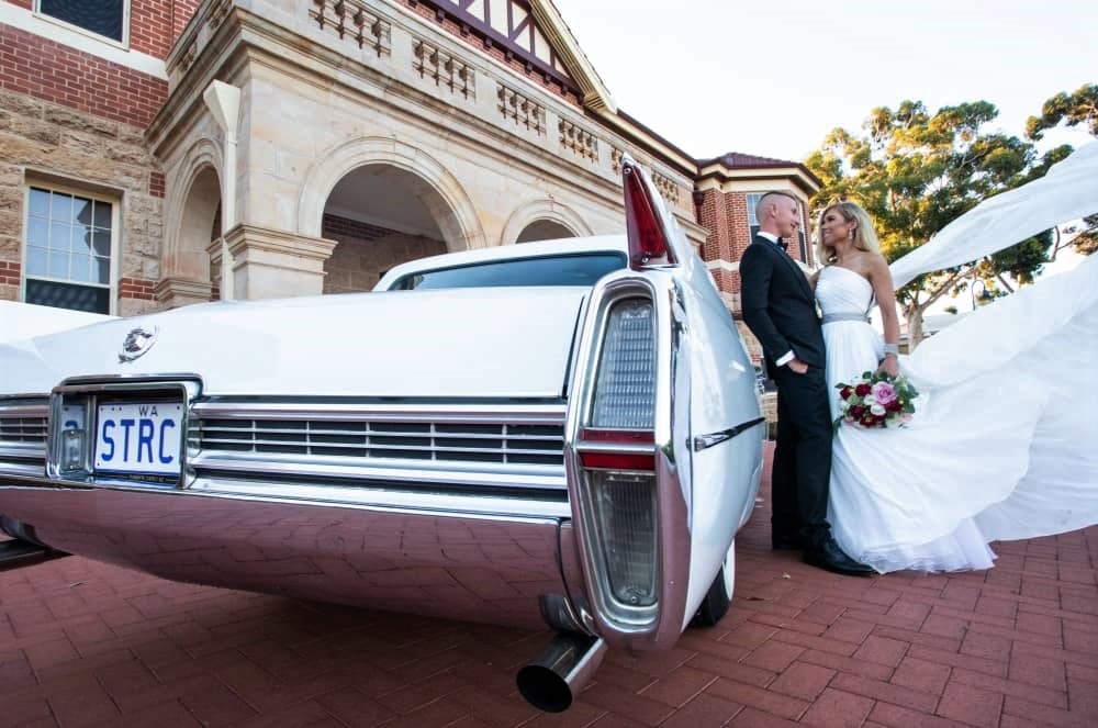 A classic car is the perfect backdrop to take some beautiful wedding photography as well.
